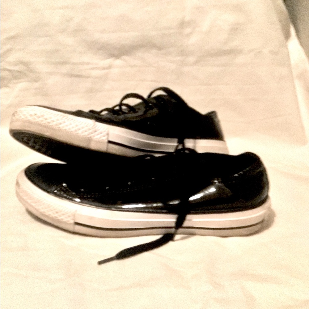 Shiny black low top Converse All Star, men’s size 4, women’s size 8